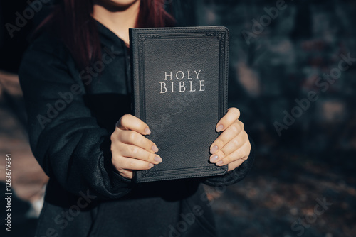 Girl holding a Bible, Christian life, choose life photo