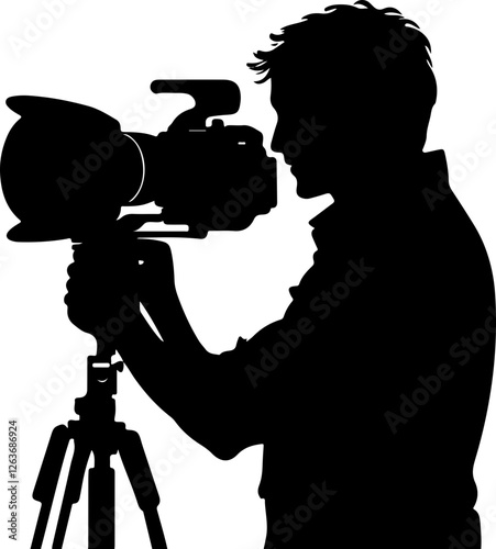 Silhouette of a Videographer with Camera