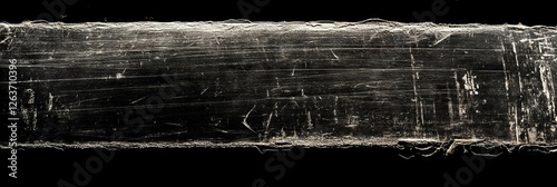 Texture of scanned film highlighting scratches and uneven grain on a black background