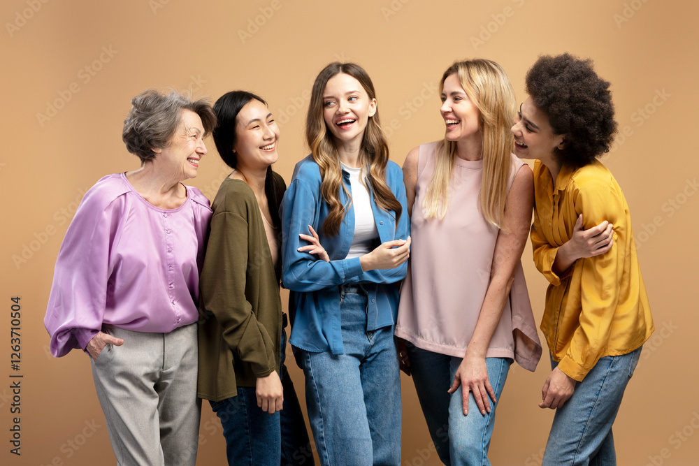 Group of cheerful women of different ages and ethnicities laughing together Group of cheerful women of different ages and ethnicities laughing together