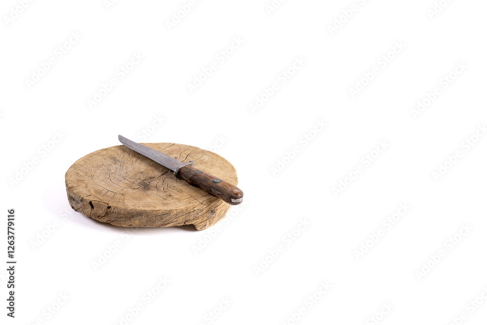 Round empty wooden cutting block with hunters knife Round empty wooden cutting block with hunters knife