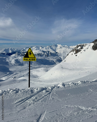cliff sign in the snow