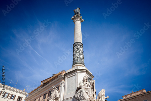 The Column of the Immaculate Conception, also known as Colonna della Immacolata, stands tall in Piazza Mignanelli near Piazza di Spagna, symbolizing Marian devotion in the heart of old Rome. photo