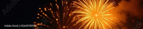 Vibrant yellow fireworks explode in a flash of light against a dark sky, radiating energy and intensity, fireworks, radiant, light photo