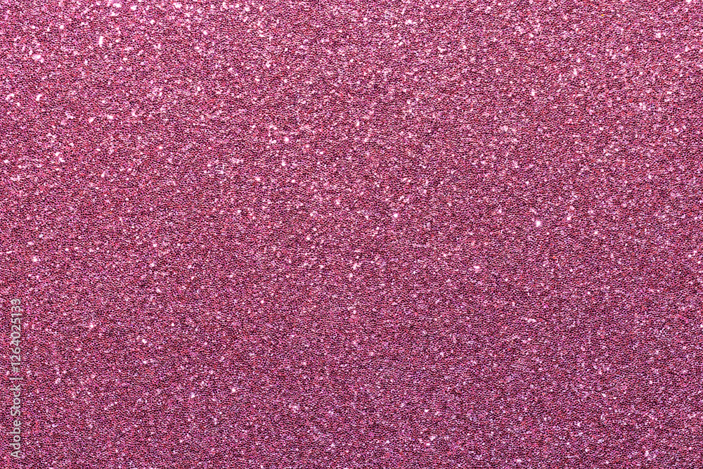 Fototapeta premium A pink background with glittery texture
