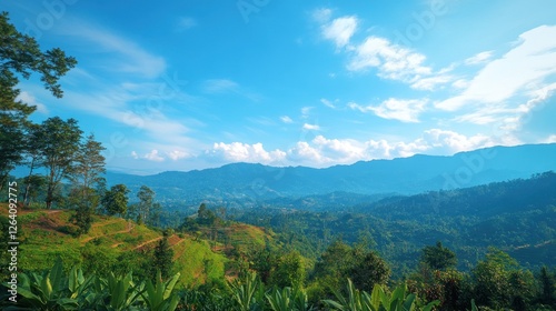 Mountainous landscape, sunny day, lush greenery, distant hills, travel brochure