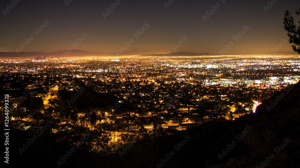 Fototapeta premium Night cityscape panorama from hilltop, distant mountains, city lights, travel brochure