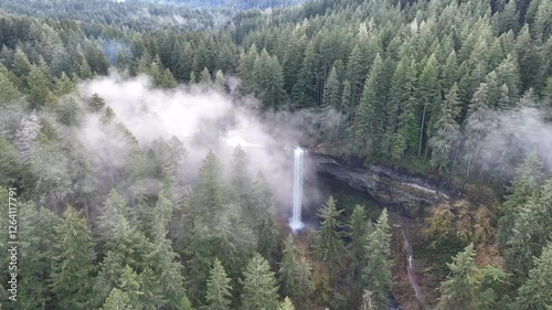 A wispy cloud drifts above the magnificent South Falls in Oregon. The entire Pacific Northwest is known for its spectacular outdoor scenery, including mountains, rivers, waterfalls, and coastline.