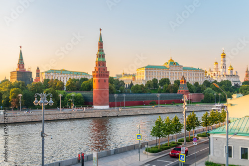 Canvas Print View of Kremlin with Vodovzvodnaya tower, Grand Kremlin Palace from repaired Bolshoy Kamenny Bridge in Moscow city on sunny summer day