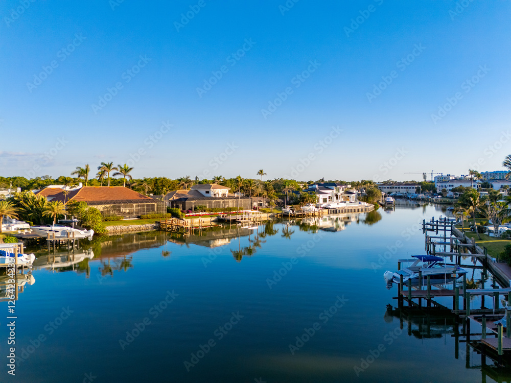 Obraz premium Naples Florida aerial photo luxury waterfront homes with boat dock