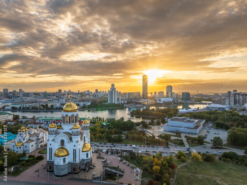 Obraz premium Autumn Yekaterinburg and Temple on Blood in beautiful clear sunset. Aerial view of Yekaterinburg, Russia. Translation of the text on the temple: Honest to the Lord is the death of His saints.