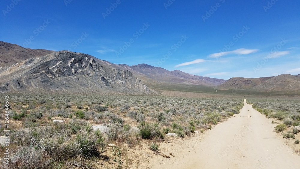 Dirt Road Past Striped Butte in Death Valley National Park, California Dirt Road Past Striped Butte in Death Valley National Park, California