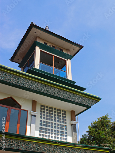 View of the side of the mosque building on a sunny day.