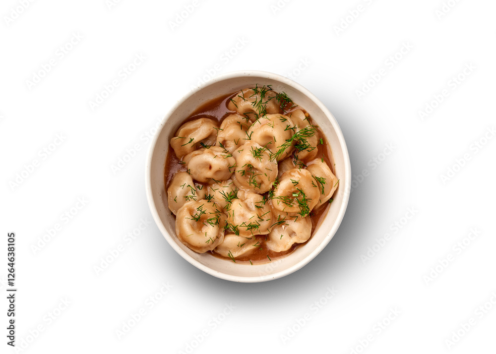 A bowl of traditional pelmeni dumplings served in a rich broth with fresh dill. A bowl of traditional pelmeni dumplings served in a rich broth with fresh dill.