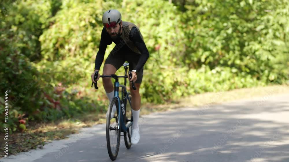 Training for cycling triathlon competition: fit athlete sport workout Training for cycling triathlon competition: fit athlete sport workout