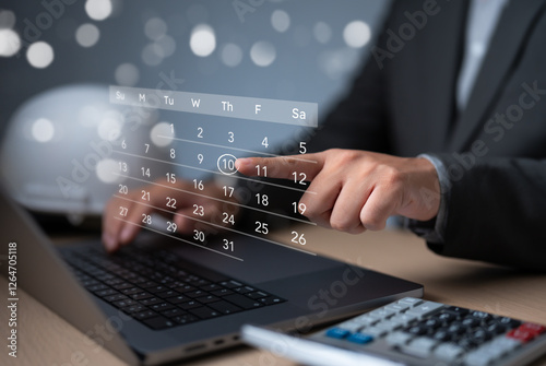 Time management ideas. Calendar on a virtual screen. Business people manage time for effective work. Make an appointment, action plans, highlight reminders, and meeting agenda on the calendar.