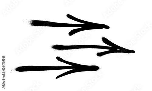 Graffiti arrows with overspray in black over white.