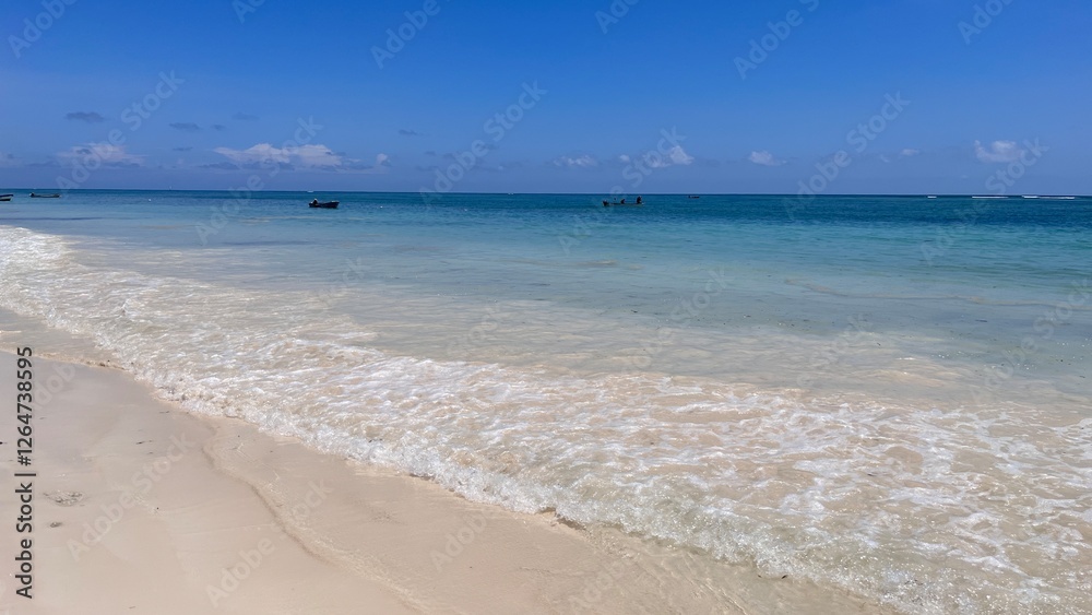 Tropical Paradise – Crystal Clear Water and White Sand Beach: A stunning tropical beach with crystal clear waters and soft white sand. Tropical Paradise – Crystal Clear Water and White Sand Beach: A stunning tropical beach with crystal clear waters and soft white sand.