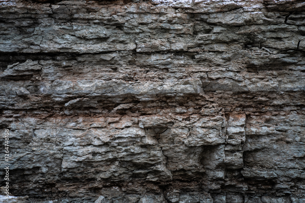Dolomite layers of debris and old house foundations. Layered rock formation Dolomite layers of debris and old house foundations. Layered rock formation