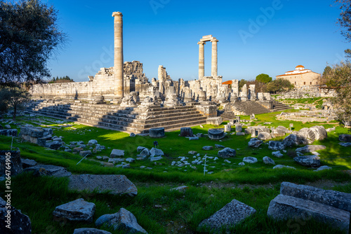 The ruins of Didyma are located a short distance to the northwest of modern Didim in Aydn Province, Turkey. It sits on a headland that in antiquity formed the Milesian Peninsula. Didyma was the larges photo