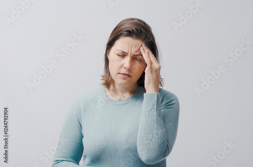 Woman suffering from severe headache