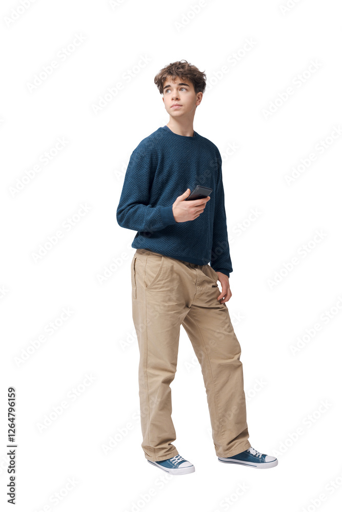 Fototapeta premium Teenager holding his smartphone and standing
