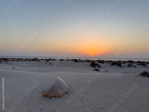 Sunset at the white sands desert also known as Sugar Dunes in Sultanate of Oman