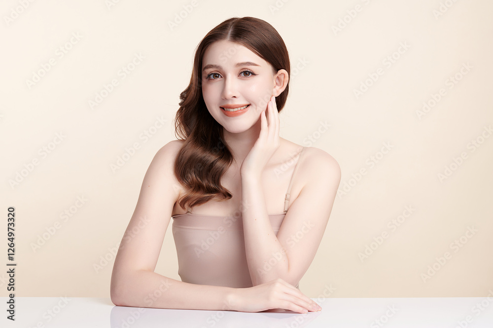 Beautiful young asian woman with clean fresh skin on beige background, Face care, Facial treatment, Cosmetology, beauty and spa, Asian women portrait. Beautiful young asian woman with clean fresh skin on beige background, Face care, Facial treatment, Cosmetology, beauty and spa, Asian women portrait.