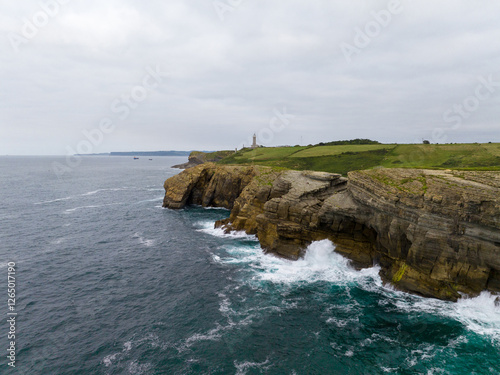 Faro de Cabo Mayor en la bahia de Santander, Cantabria photo