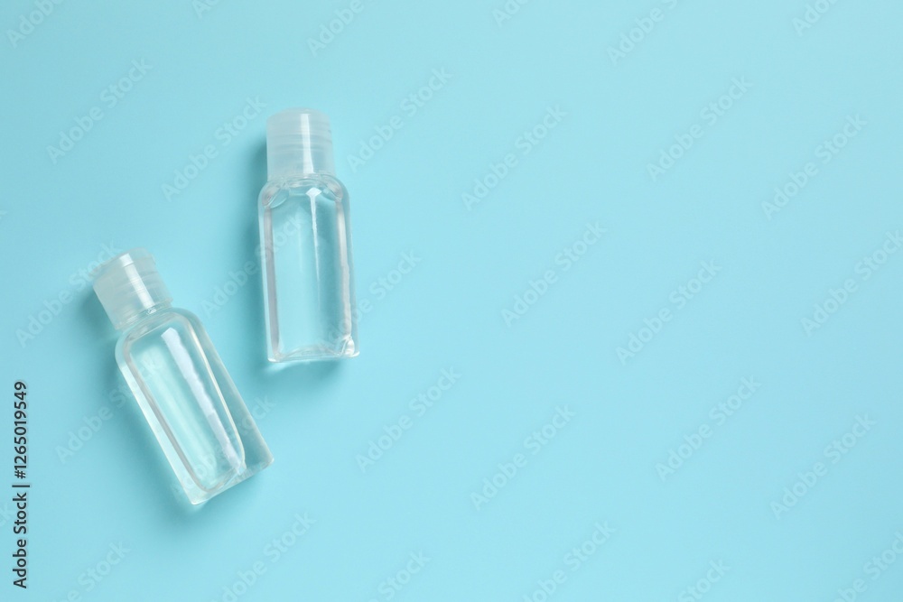 Naklejka premium Natural cosmetic products on a blue background, top view