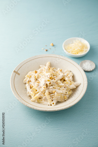 Pasta with cream sauce and walnut photo