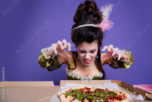 Elegant woman in historic costume enjoying modern pizza on a vibrant purple background photo