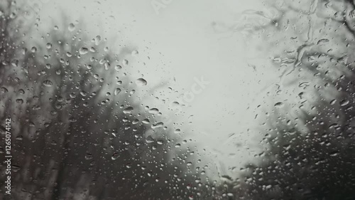 Rainy scenery outside car window