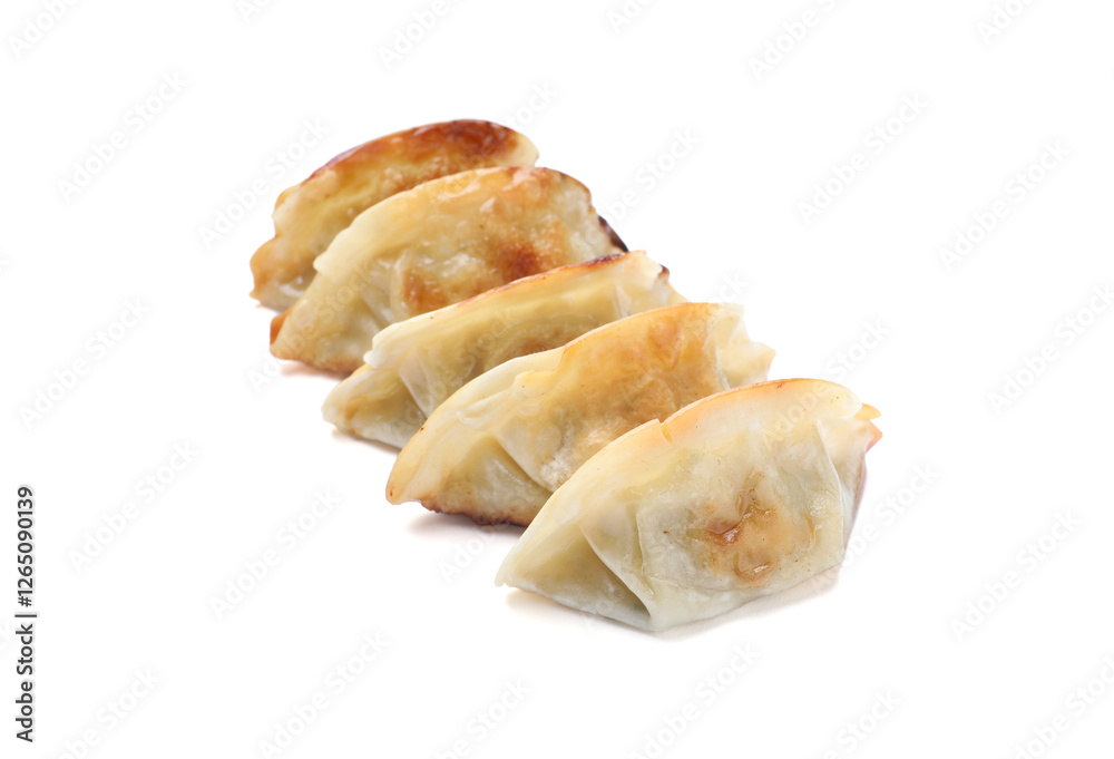 Delicious fried gyoza dumplings isolated on white Delicious fried gyoza dumplings isolated on white