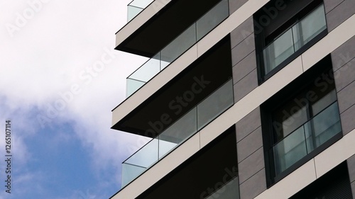Profile of contemporary residential facade balconies against the sky