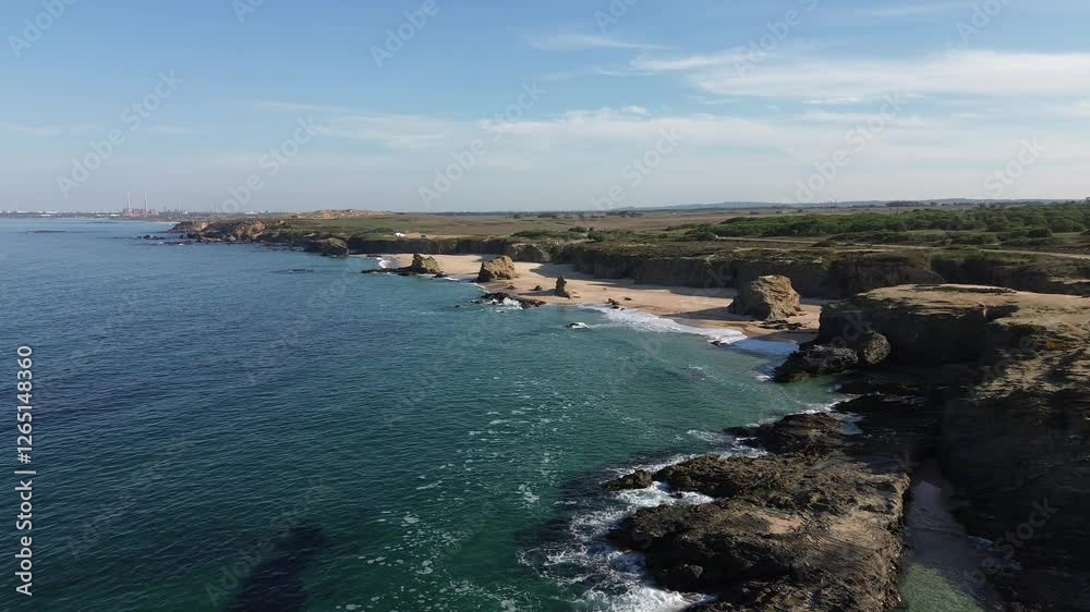 Coastal view by drone of a rocky beach with waves coming in Coastal view by drone of a rocky beach with waves coming in