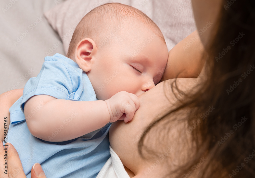 mother breastfeeding her newborn baby, close up mother breastfeeding her newborn baby, close up