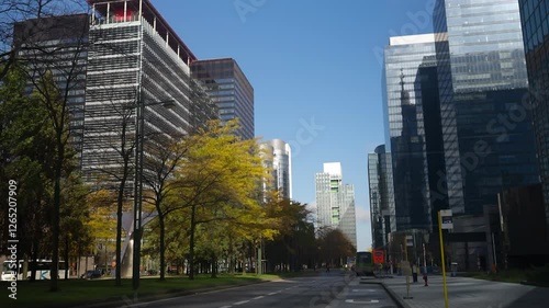 City street Bd Roi Albert II with modern office building in Brussels