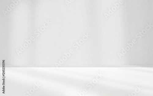 A minimalist white studio background perfect for product presentations and design projects.
