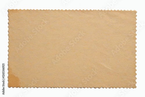 a close up of a piece of brown paper with scallop edges