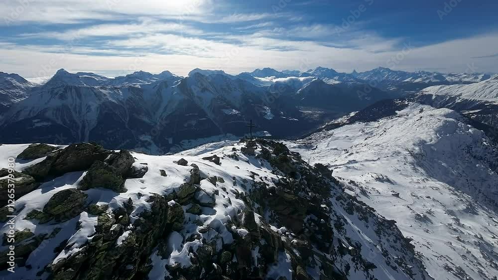 Drone Aerial View over the majestic Swiss Alps showcasing the grand alpine landscape with Matterhorn in the background in Aletsch Ski Resort, Switzerland. Amazing ski, snowboard destination. Drone Aerial View over the majestic Swiss Alps showcasing the grand alpine landscape with Matterhorn in the background in Aletsch Ski Resort, Switzerland. Amazing ski, snowboard destination.