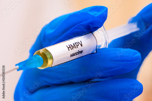 HMPV is a negative-sense single-stranded RNA virus of the family Pneumovirus. Stethoscope on white background. photo