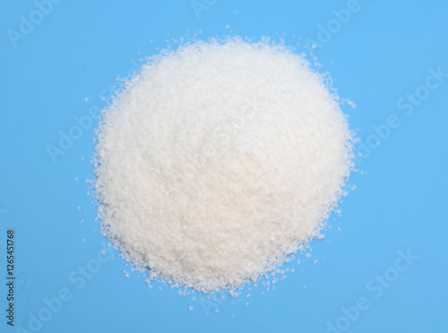 Alkylbenzene sulfonates powder on blue background photo
