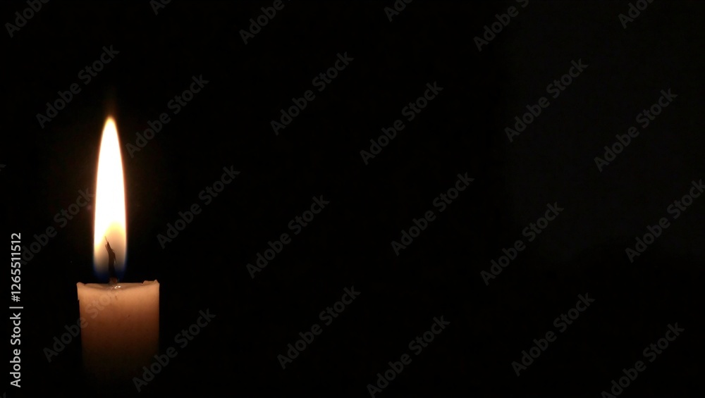 A single candle flame burning softly in the darkness, casting a warm and intimate glow A single candle flame burning softly in the darkness, casting a warm and intimate glow