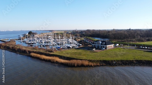 Port of Willemstad in the Netherlands. A modern harbor on the waters of the Haringvliet and Hollandsdiep. Drone aerial photo from the air. Europe travel and adventure.