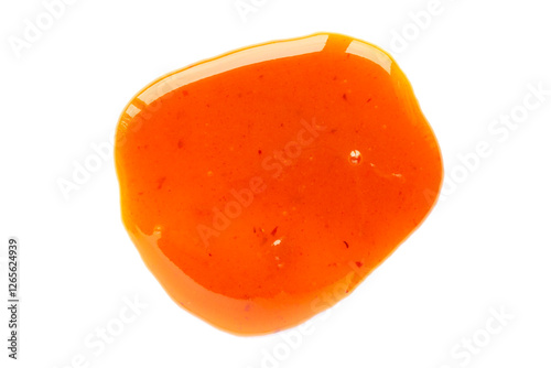 Delicious sea buckthorn jam isolated on white background, top view. Orange spot of sea buckthorn jam. Spilled spot of sea buckthorn jam isolated on white background. Orange background of fruit jam.