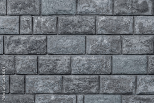 Gray brick wall with a gray brick