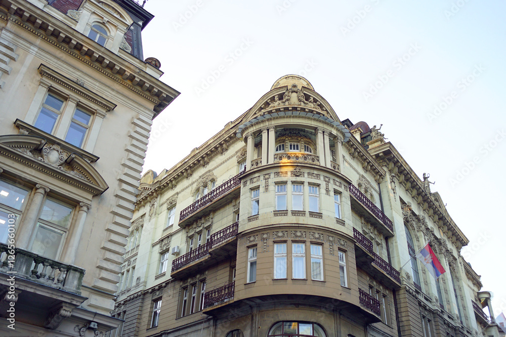 Fototapeta premium Examples of European architecture in Serbia: exterior view of buildings with beautiful stone decoration on Knez Mihailova Street (Nikola Spasic House and the Serbian Academy of Science and Arts)