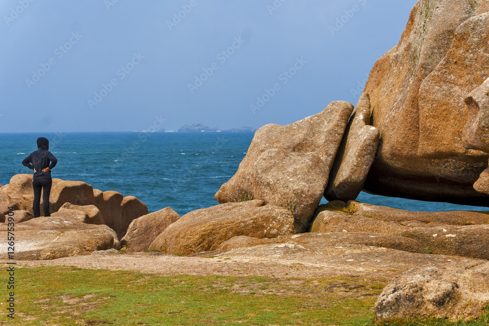 rocks and boulders on The Pink Granite Coast a stunning stretch of coastline located in northern Brittany, France. rocks and boulders on The Pink Granite Coast a stunning stretch of coastline located in northern Brittany, France.