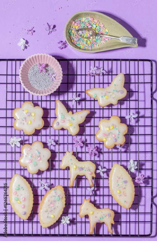 Easter composition of shortbread cookies and colored sugar.